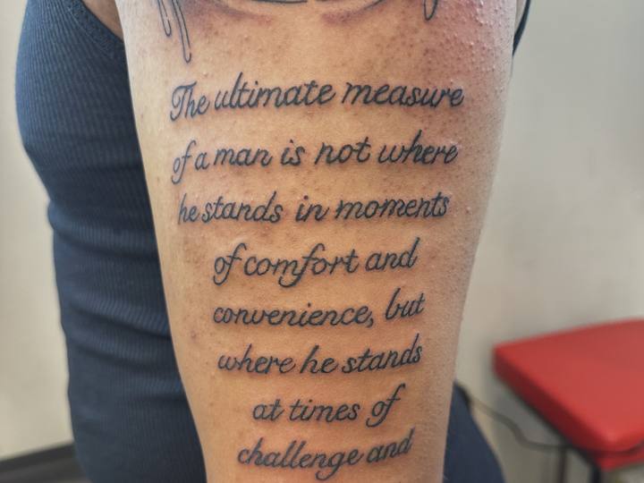 A script quote down the length of an arm